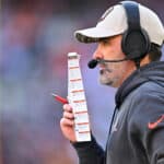 CLEVELAND, OHIO - NOVEMBER 19: Head coach Kevin Stefanski of the Cleveland Browns calls plays in the fourth quarter against the Pittsburgh Steelers at Cleveland Browns Stadium on November 19, 2023 in Cleveland, Ohio. (