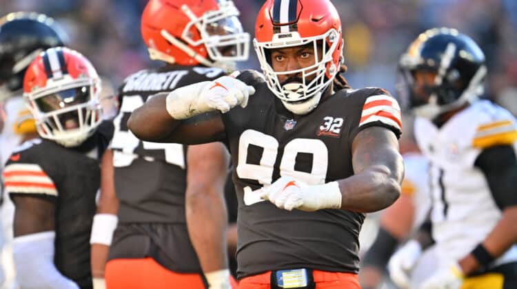 CLEVELAND, OHIO - NOVEMBER 19: Za'Darius Smith #99 of the Cleveland Browns celebrates in the third quarter against the Pittsburgh Steelers at Cleveland Browns Stadium on November 19, 2023 in Cleveland, Ohio.