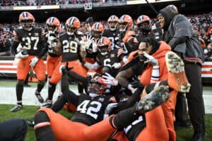 CLEVELAND, OHIO - DECEMBER 17: D'Anthony Bell #37 of the Cleveland Browns celebrates with teammates after intercepting a pass in the end zone during the fourth quarter to win the game over the Chicago Bears at Cleveland Browns Stadium on December 17, 2023 in Cleveland, Ohio.