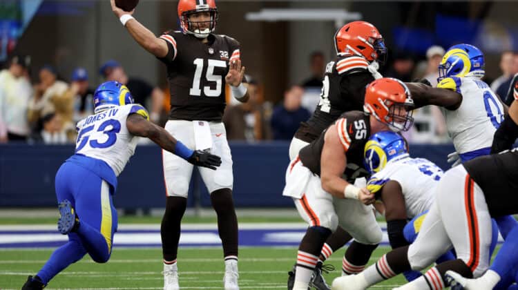 INGLEWOOD, CALIFORNIA - DECEMBER 03: Joe Flacco #15 of the Cleveland Browns passes as he is rushed by Ernest Jones #53 of the Los Angeles Rams during a 36-19 loss to the Los Angeles Rams at SoFi Stadium on December 03, 2023 in Inglewood, California.