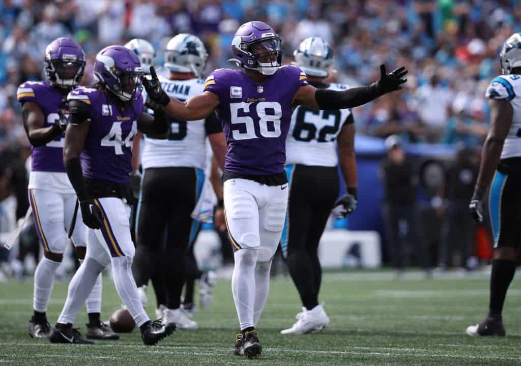 Jordan Hicks #58 of the Minnesota Vikings reacts against the Carolina Panthers during the fourth quarter at Bank of America Stadium on October 01, 2023 in Charlotte, North Carolina.