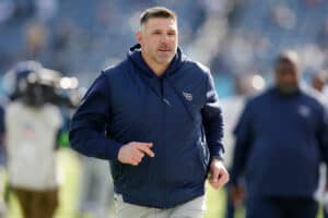 Tennessee Titans head coach Mike Vrabel runs on the field before the game against the Jacksonville Jaguars at Nissan Stadium on January 07, 2024 in Nashville, Tennessee.
