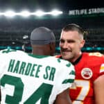 Justin Hardee #34 of the New York Jets congratulates Travis Kelce #87 of the Kansas City Chiefs after the game at MetLife Stadium on October 01, 2023 in East Rutherford, New Jersey.
