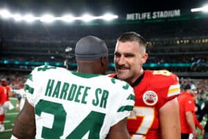 Justin Hardee #34 of the New York Jets congratulates Travis Kelce #87 of the Kansas City Chiefs after the game at MetLife Stadium on October 01, 2023 in East Rutherford, New Jersey.