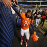 D'Onta Foreman #21 of the Chicago Bears greets fans after a 16-13 victory against the Carolina Panthers at Soldier Field on November 09, 2023 in Chicago, Illinois.
