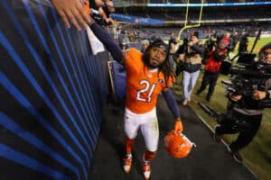 D'Onta Foreman #21 of the Chicago Bears greets fans after a 16-13 victory against the Carolina Panthers at Soldier Field on November 09, 2023 in Chicago, Illinois.