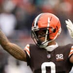 Greg Newsome II #0 of the Cleveland Browns interacts with the crowd during the second quarter against the Jacksonville Jaguars at Cleveland Browns Stadium on December 10, 2023 in Cleveland, Ohio.