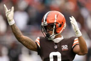 Greg Newsome II #0 of the Cleveland Browns interacts with the crowd during the second quarter against the Jacksonville Jaguars at Cleveland Browns Stadium on December 10, 2023 in Cleveland, Ohio.