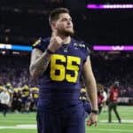 Zak Zinter #65 of the Michigan Wolverines reacts prior to the 2024 CFP National Championship game against the Washington Huskies at NRG Stadium on January 08, 2024 in Houston, Texas.