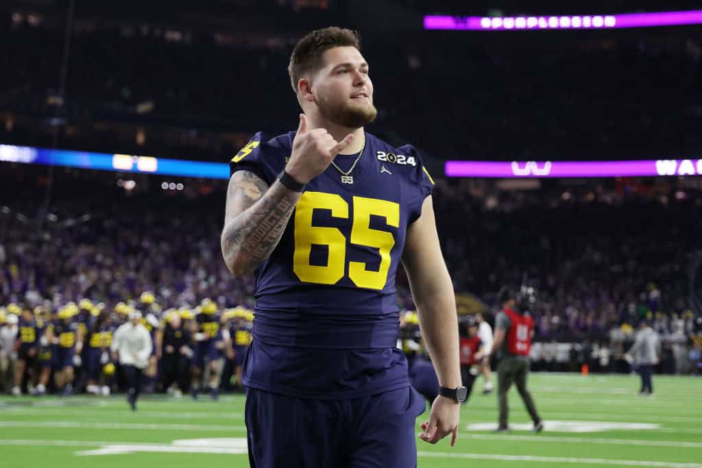 Zak Zinter #65 of the Michigan Wolverines reacts prior to the 2024 CFP National Championship game against the Washington Huskies at NRG Stadium on January 08, 2024 in Houston, Texas.