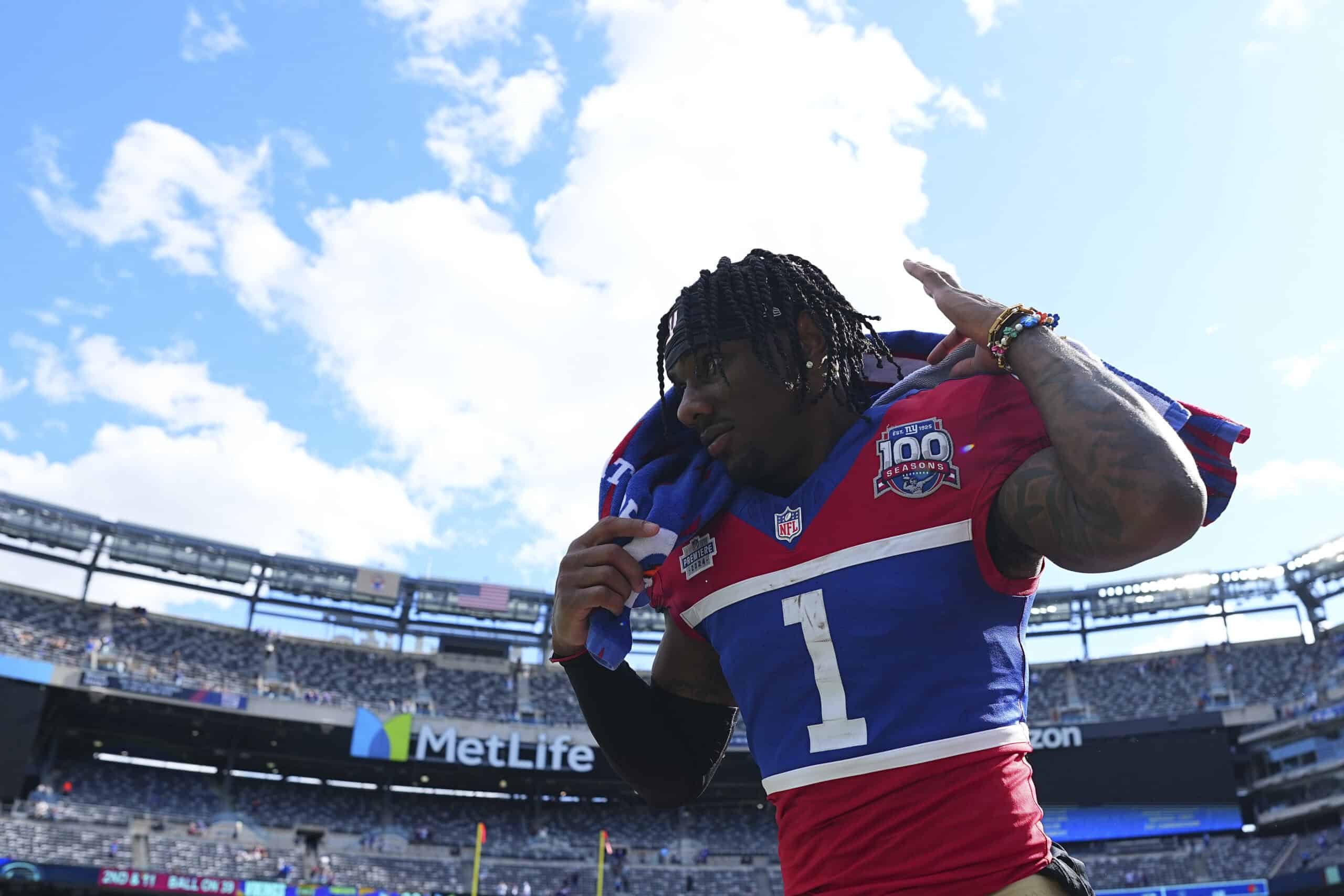 EAST RUTHERFORD, NEW JERSEY - SEPTEMBER 8: Malik Nabers #1 of the New York Giants runs off the field after the game against the Minnesota Vikings at MetLife Stadium on September 8, 2024 in East Rutherford, New Jersey.