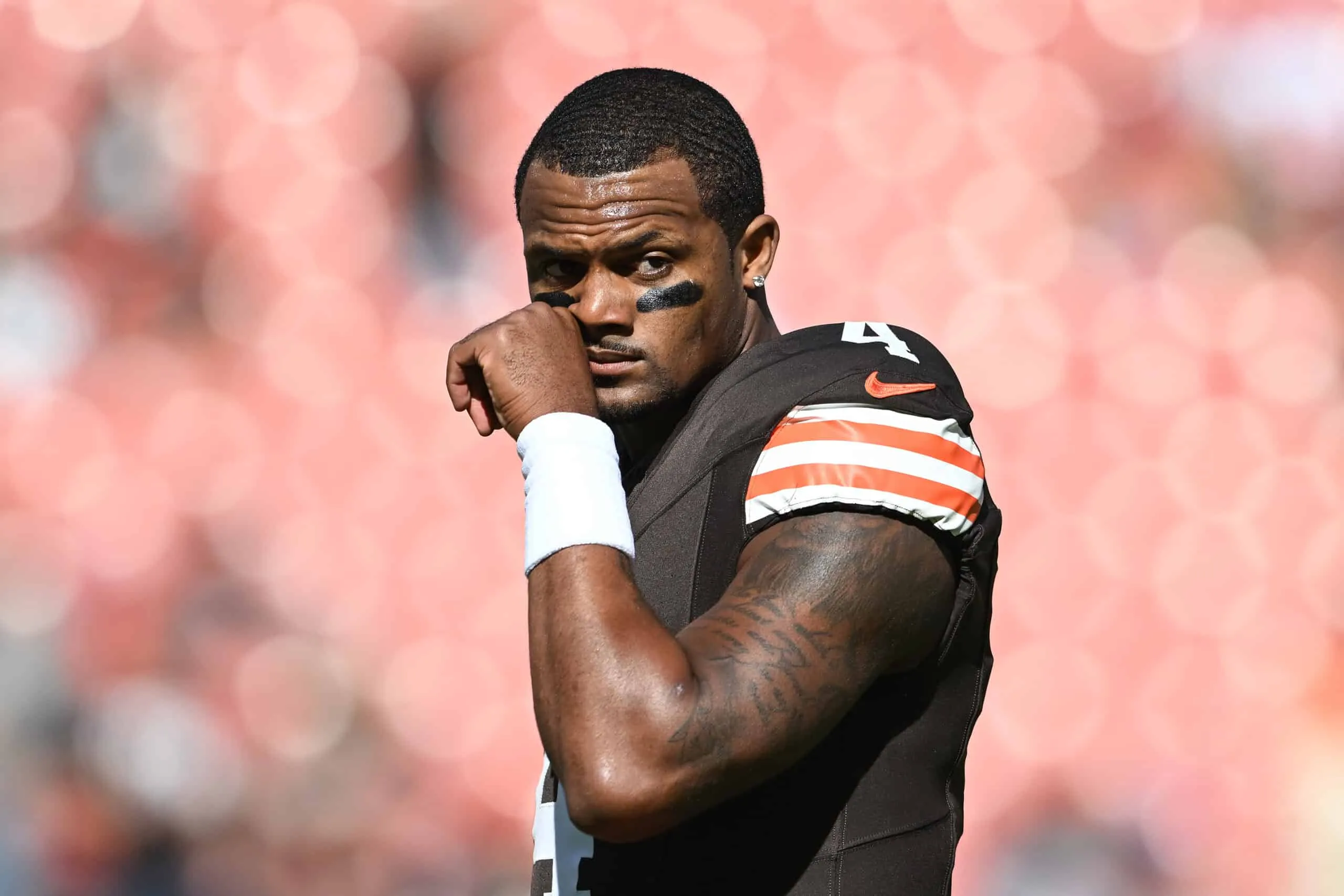 CLEVELAND, OHIO - OCTOBER 20: Deshaun Watson #4 of the Cleveland Browns looks on during warmups before a game against the Cincinnati Bengals at Huntington Bank Field on October 20, 2024 in Cleveland, Ohio.