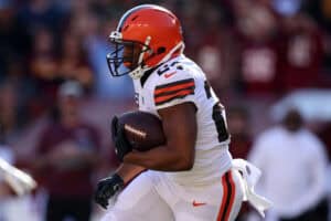 LANDOVER, MARYLAND - JANUARY 01: Nick Chubb #24 of the Cleveland Browns runs the ball during the first quarter against the Washington Commanders at FedExField on January 01, 2023 in Landover, Maryland.