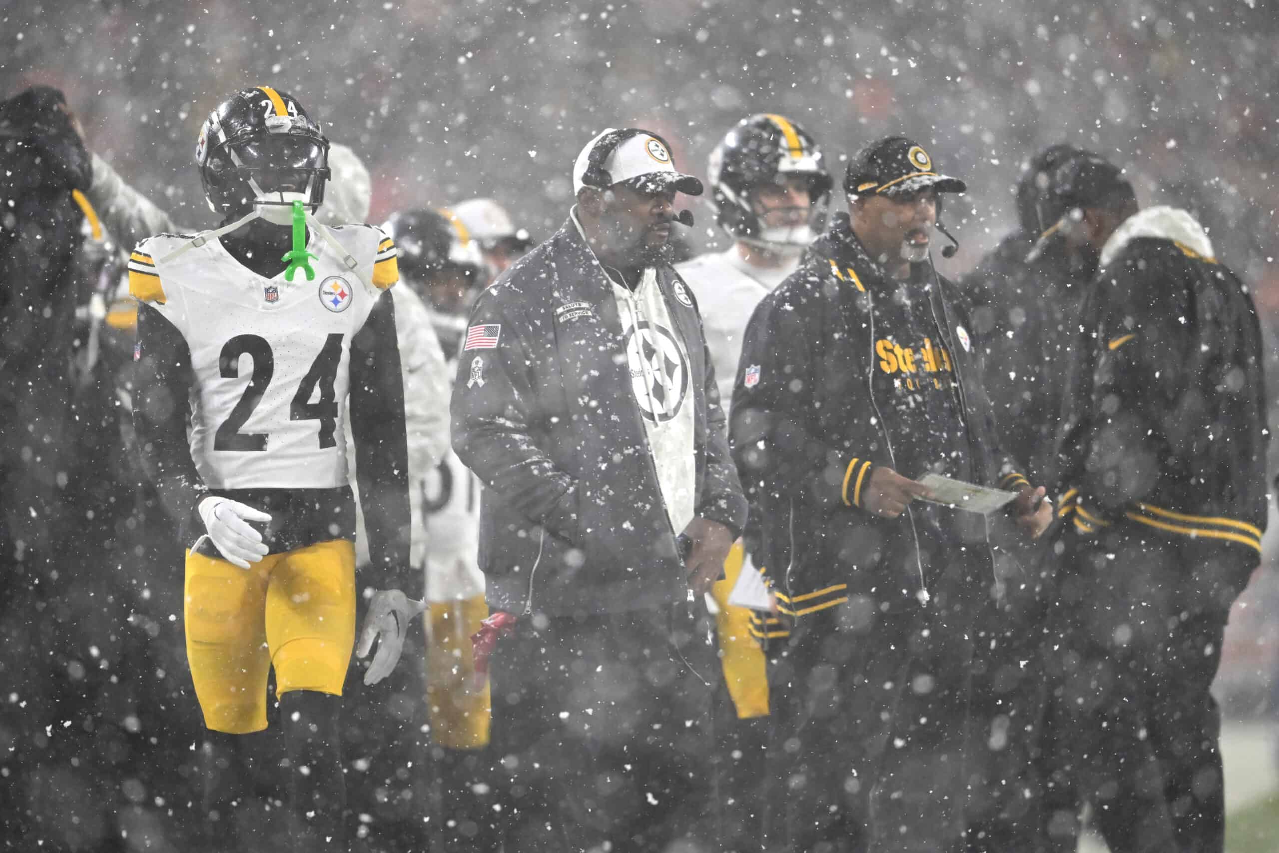 CLEVELAND, OHIO - NOVEMBER 21: Head coach Mike Tomlin of the Pittsburgh Steelers looks on as snow falls against the Cleveland Browns during the fourth quarter in the game at Huntington Bank Field on November 21, 2024 in Cleveland, Ohio.