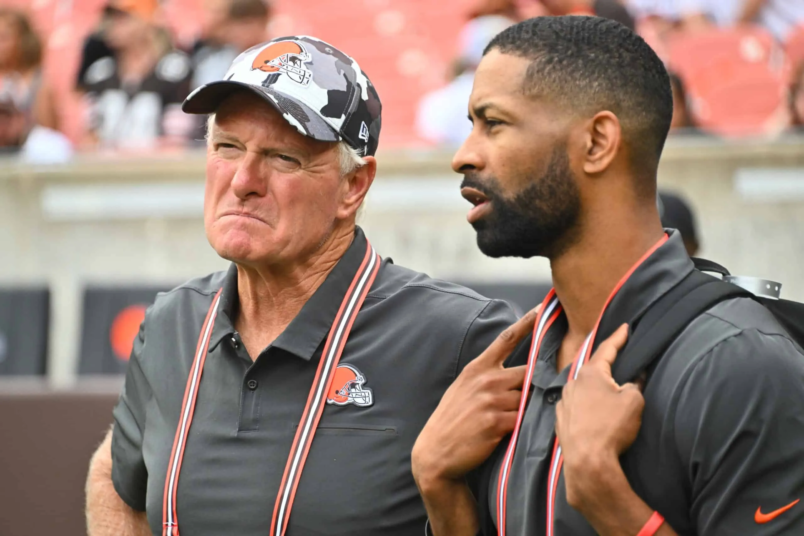 CLEVELAND, OHIO - AUGUST 21: Cleveland Browns co-owner Jimmy Haslam talks with General Manager Andrew Berry during the fourth quarter of a preseason game against the Philadelphia Eagles at FirstEnergy Stadium on August 21, 2022 in Cleveland, Ohio. The Eagles defeated the Browns 21-20.