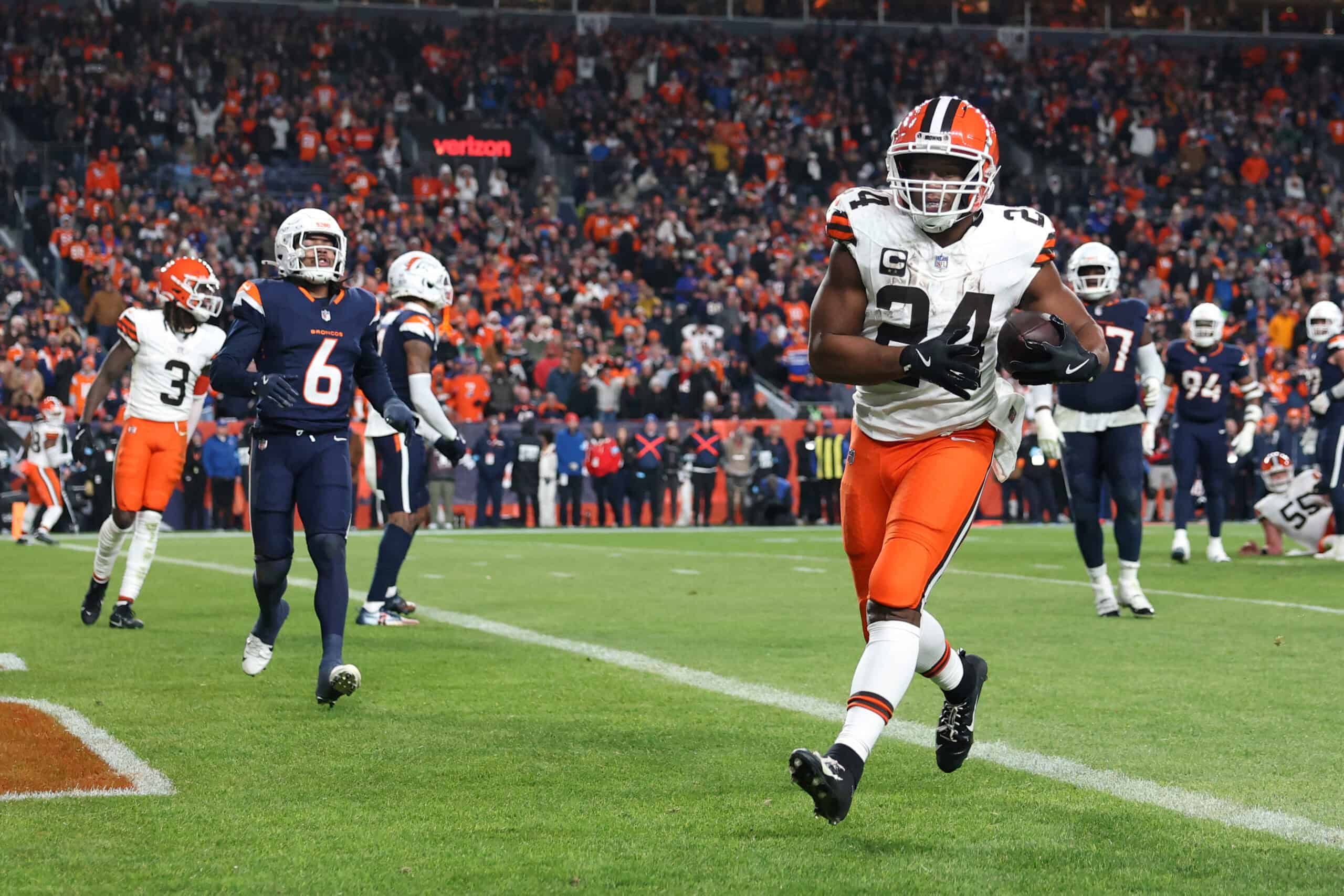 DENVER, COLORADO - DECEMBER 02: Nick Chubb #24 of the Cleveland Browns scores a 5 yard touchdown against the Denver Broncos during the fourth quarter in the game at Empower Field At Mile High on December 02, 2024 in Denver, Colorado.