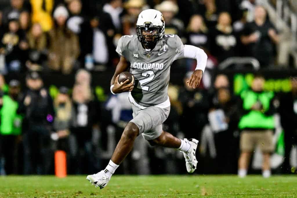 BOULDER, CO - OCTOBER 26: Shedeur Sanders #2 of the Colorado Buffaloes carries the ball in the first quarter against the Cincinnati Bearcats at Folsom Field on October 26, 2024 in Boulder, Colorado.