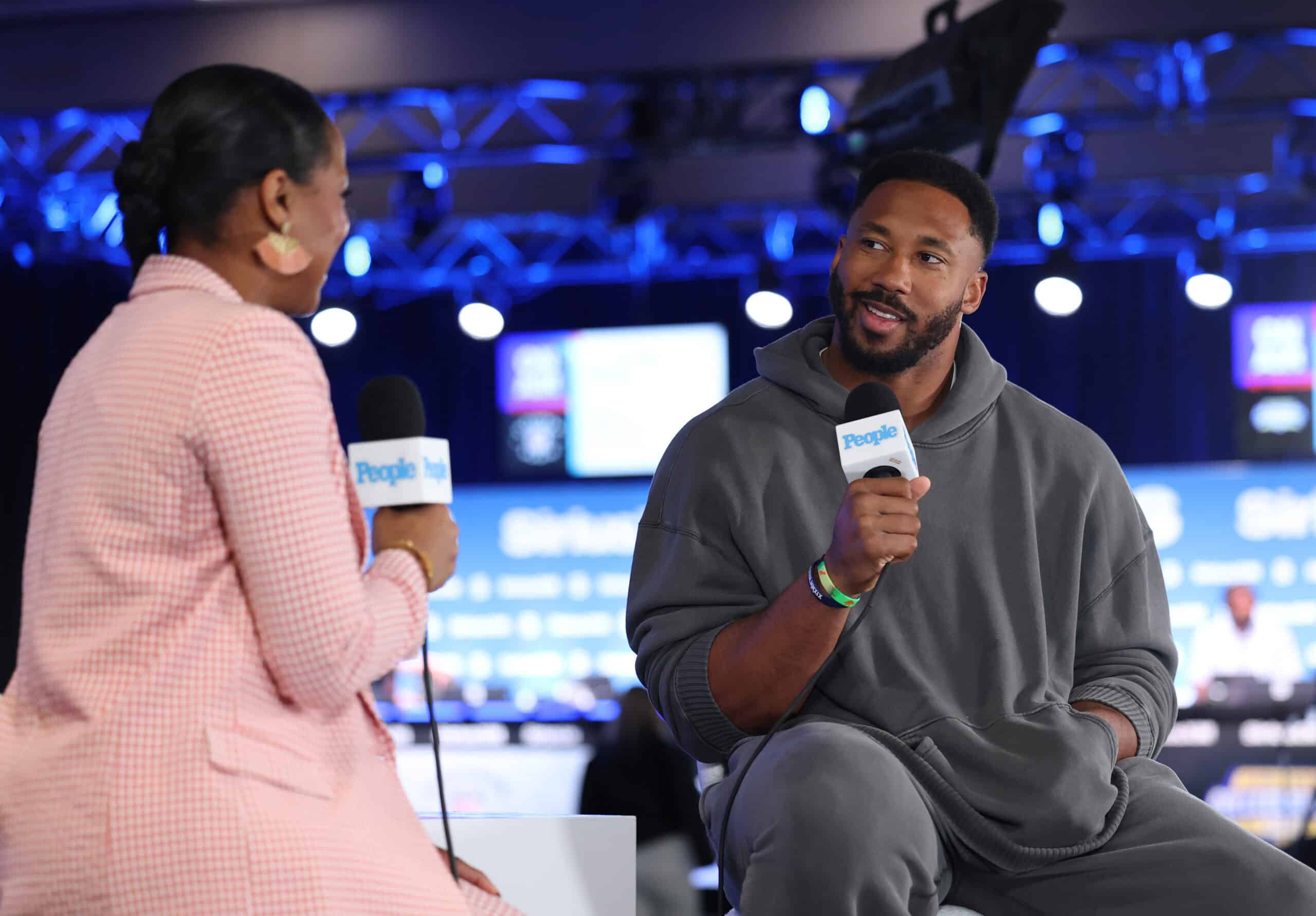NEW ORLEANS, LOUISIANA - FEBRUARY 05: (L-R) Janine Rubenstein and Myles Garrett visit SiriusXM at Super Bowl LIX on February 05, 2025 in New Orleans, Louisiana.
