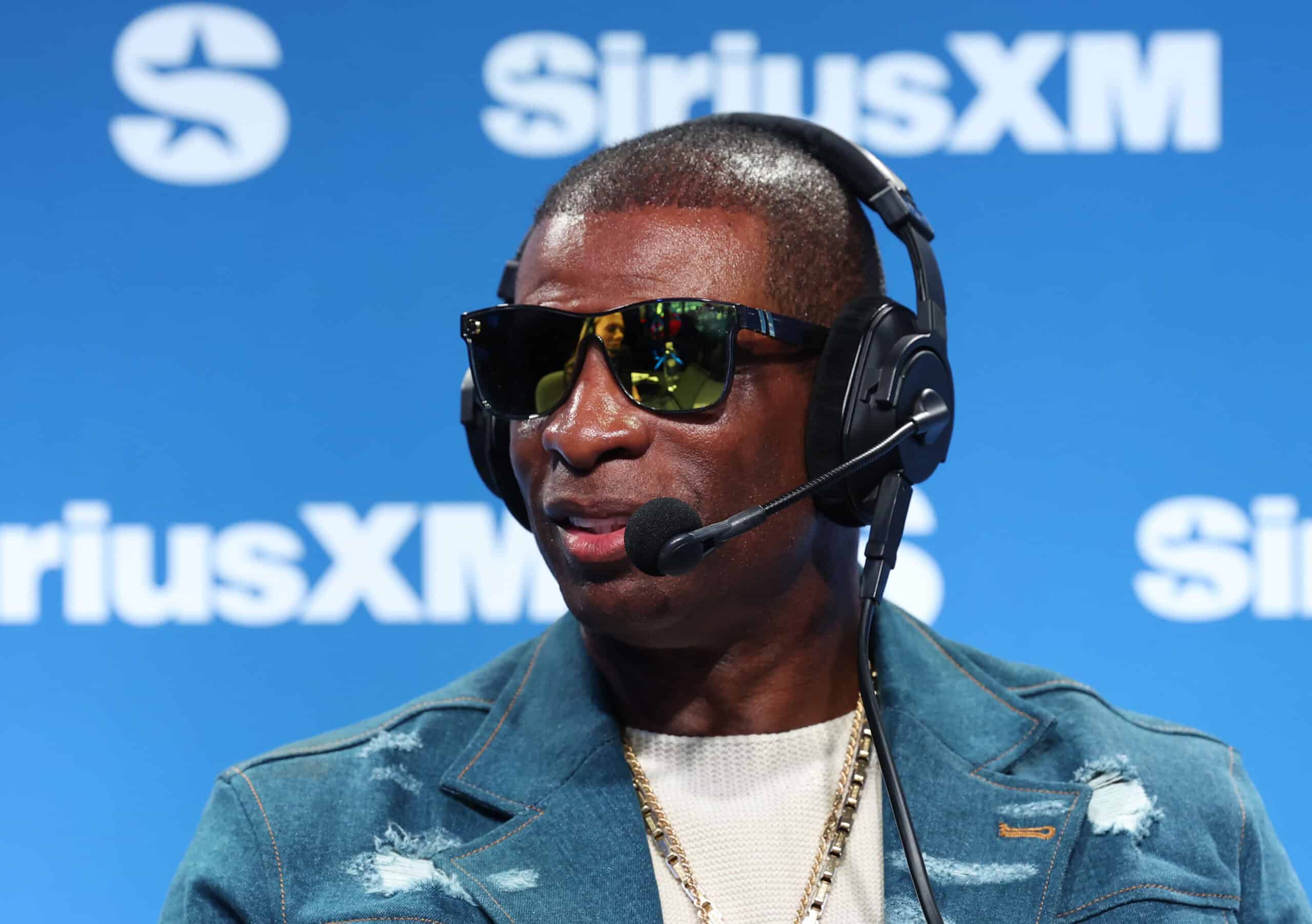 NEW ORLEANS, LOUISIANA - FEBRUARY 07: Deion Sanders speaks on SiriusXM on radio row at Super Bowl LIX on February 07, 2025 in New Orleans, Louisiana.