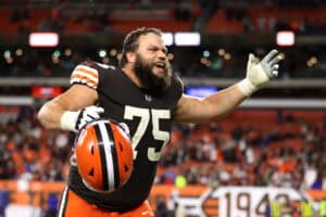 CLEVELAND, OHIO - OCTOBER 21: Guard Joel Bitonio #75 of the Cleveland Browns celebrates after the Browns defeated the Denver Broncos at FirstEnergy Stadium on October 21, 2021 in Cleveland, Ohio.