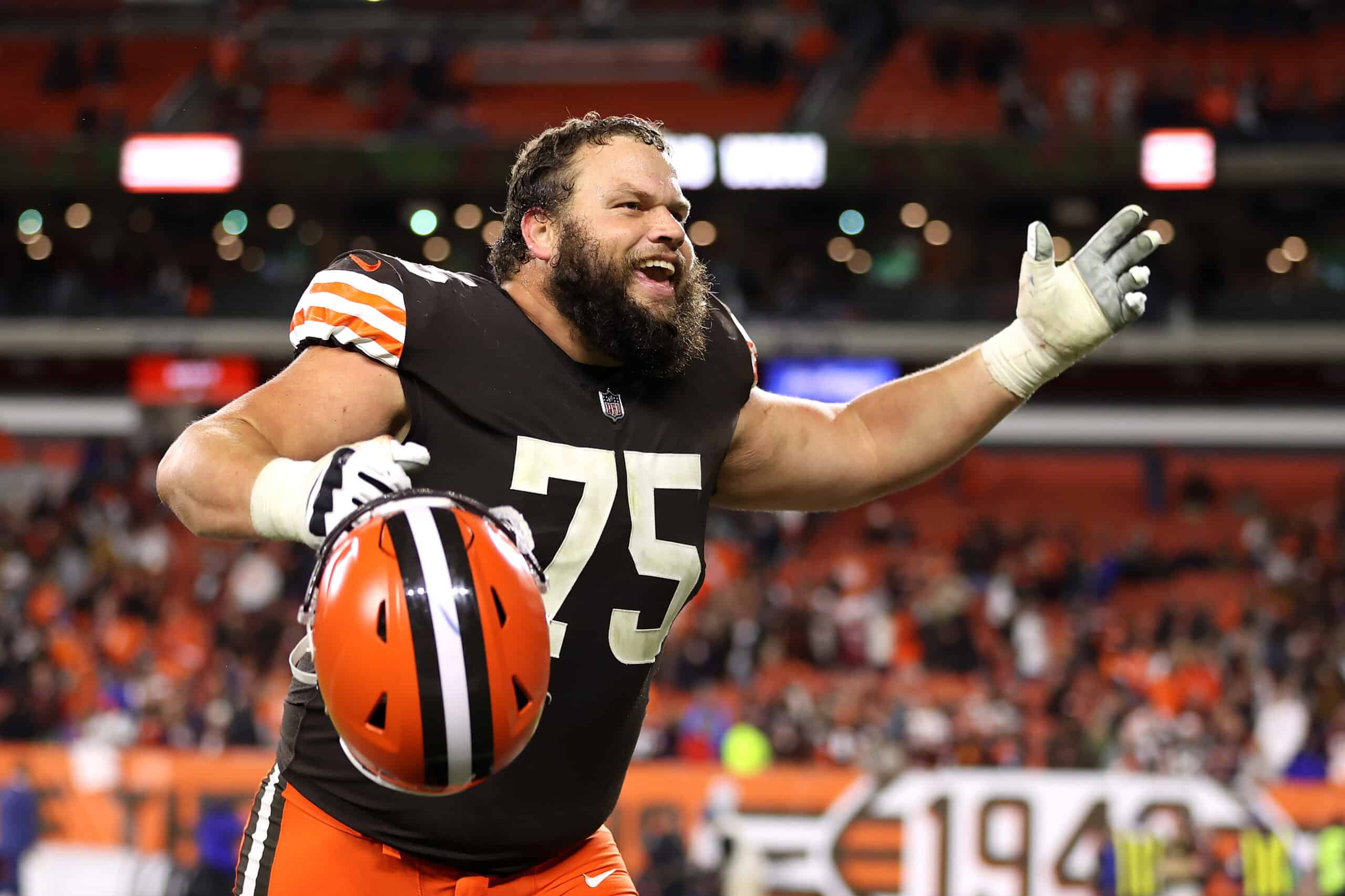 CLEVELAND, OHIO - OCTOBER 21: Guard Joel Bitonio #75 of the Cleveland Browns celebrates after the Browns defeated the Denver Broncos at FirstEnergy Stadium on October 21, 2021 in Cleveland, Ohio.