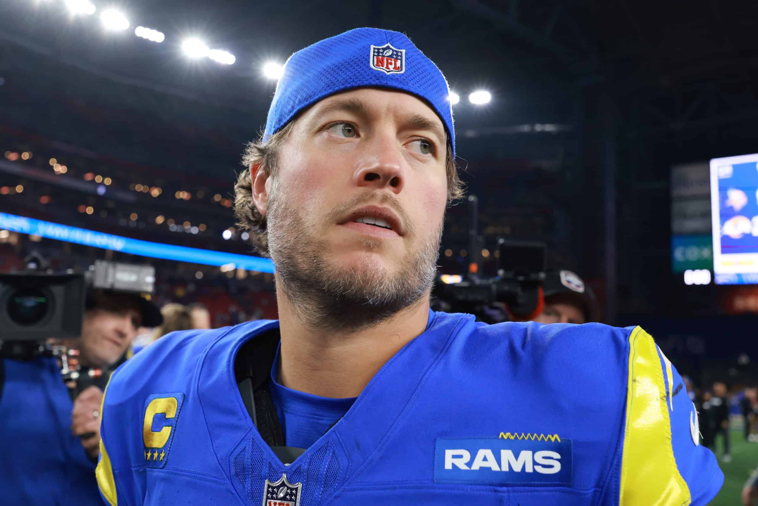 GLENDALE, ARIZONA - JANUARY 13: Matthew Stafford #9 of the Los Angeles Rams looks on after the game against the Minnesota Vikings during the NFC Wild Card Playoff at State Farm Stadium on January 13, 2025 in Glendale, Arizona.