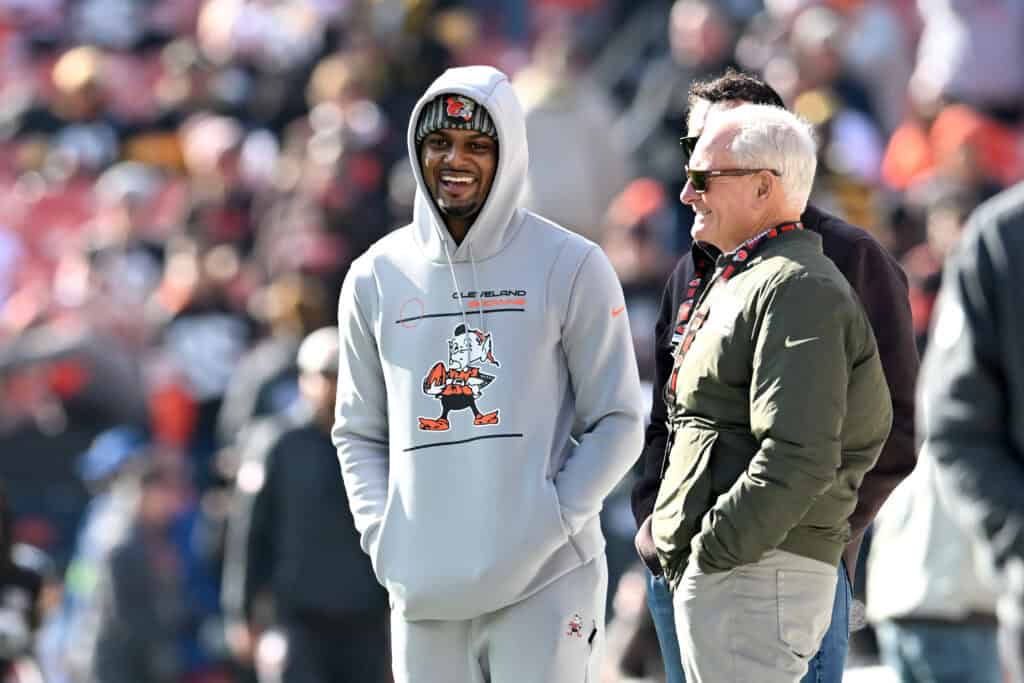 CLEVELAND, OHIO - NOVEMBER 19: Deshaun Watson #4 of the Cleveland Browns meets with owner Jimmy Haslam before the game against the Pittsburgh Steelers at Cleveland Browns Stadium on November 19, 2023 in Cleveland, Ohio.