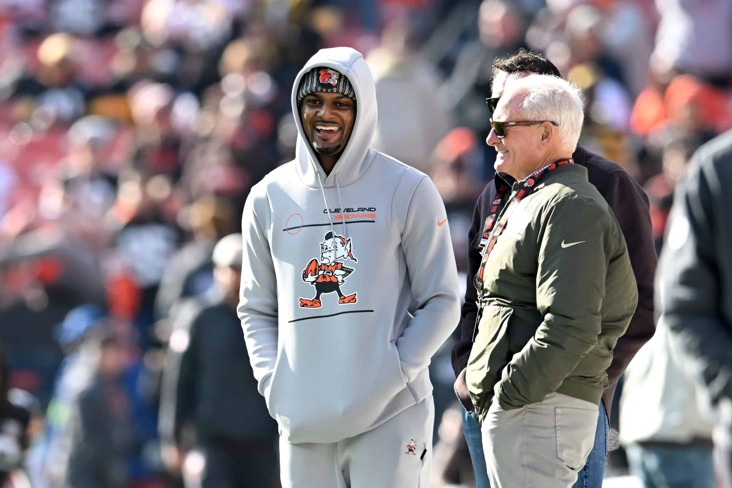 CLEVELAND, OHIO - NOVEMBER 19: Deshaun Watson #4 of the Cleveland Browns meets with owner Jimmy Haslam before the game against the Pittsburgh Steelers at Cleveland Browns Stadium on November 19, 2023 in Cleveland, Ohio.
