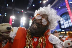 KANSAS CITY, MO - APRIL 28: A Cleveland Browns fan smiles during the second round of the 2023 NFL Draft at Union Station on April 28, 2023 in Kansas City, Missouri.