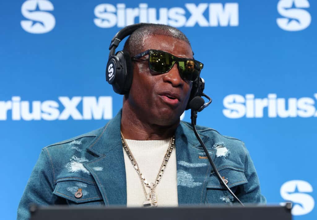 NEW ORLEANS, LOUISIANA - FEBRUARY 07: Deion Sanders speaks on SiriusXM on radio row at Super Bowl LIX on February 07, 2025 in New Orleans, Louisiana.
