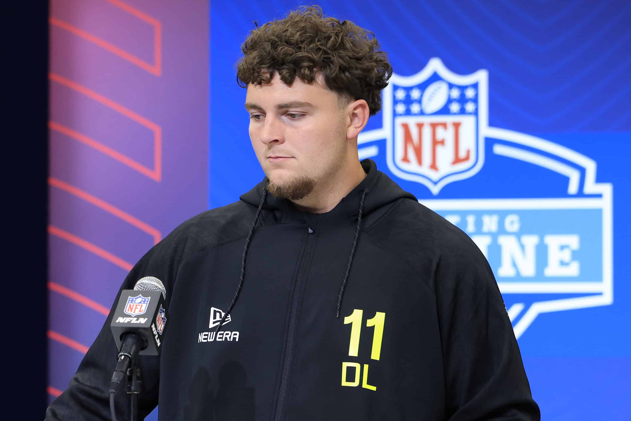 INDIANAPOLIS, INDIANA - FEBRUARY 26: Mason Graham #DL11 of Michigan speaks to the media during the 2025 NFL Combine at the Indiana Convention Center on February 26, 2025 in Indianapolis, Indiana.