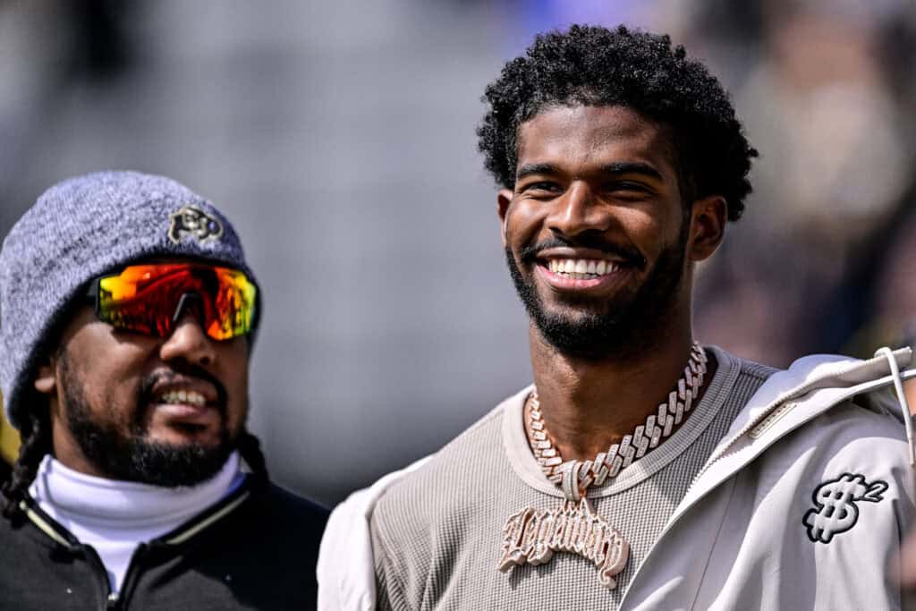BOULDER, CO - APRIL 19: Former Colorado Buffaloes quarterback Shedeur Sanders looks on during a ceremony to retire his jersey before the Black and Gold Spring Game at Folsom Field on April 19, 2025 in Boulder, Colorado.
