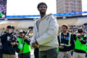 BOULDER, CO - APRIL 19: Former Colorado Buffaloes quarterback Shedeur Sanders looks on during a ceremony to retire his jersey before the Black and Gold Spring Game at Folsom Field on April 19, 2025 in Boulder, Colorado.