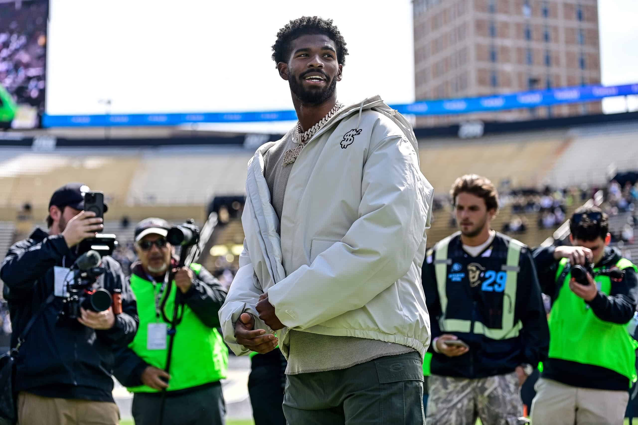 BOULDER, CO - APRIL 19: Former Colorado Buffaloes quarterback Shedeur Sanders looks on during a ceremony to retire his jersey before the Black and Gold Spring Game at Folsom Field on April 19, 2025 in Boulder, Colorado.