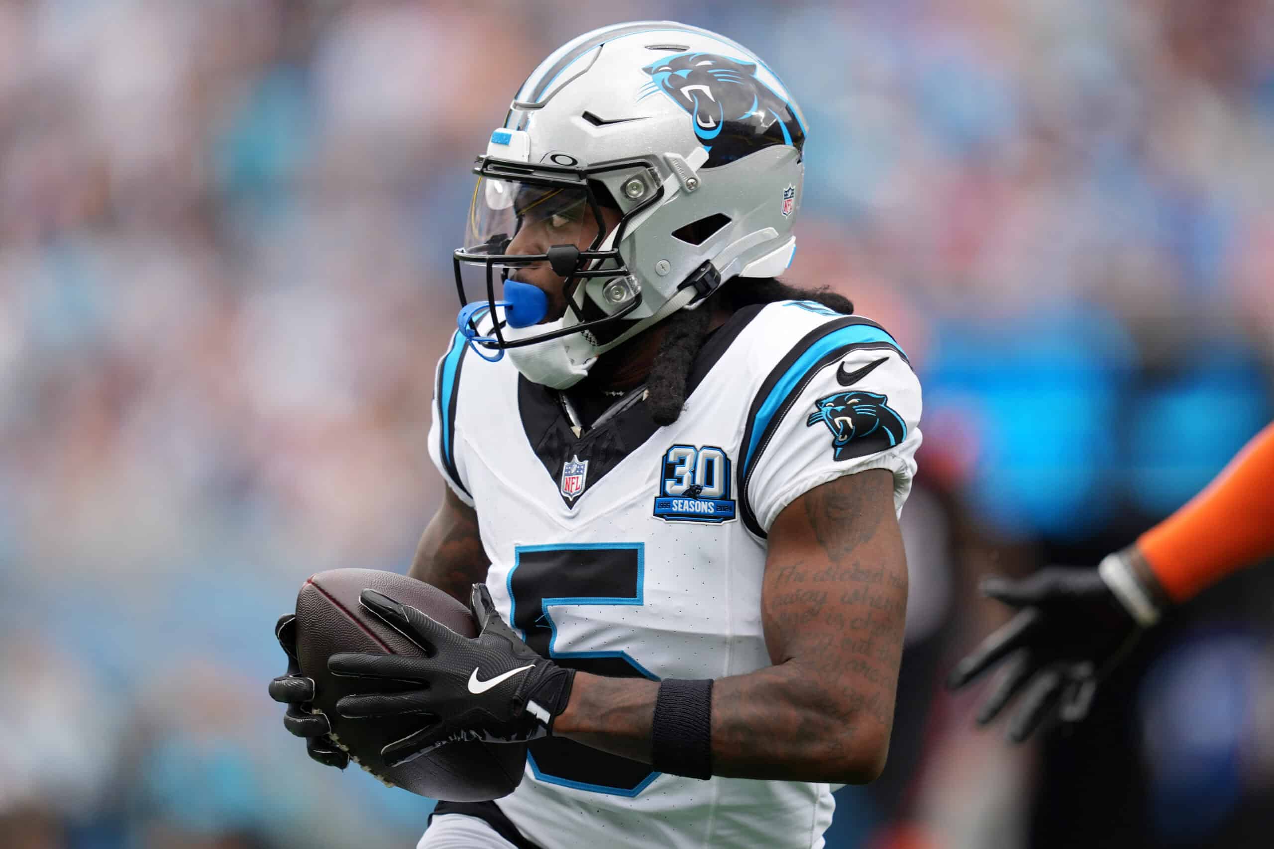 CHARLOTTE, NORTH CAROLINA - SEPTEMBER 29: Diontae Johnson #5 of the Carolina Panthers catches a pass against the Cincinnati Bengals during the first quarter at Bank of America Stadium on September 29, 2024 in Charlotte, North Carolina.