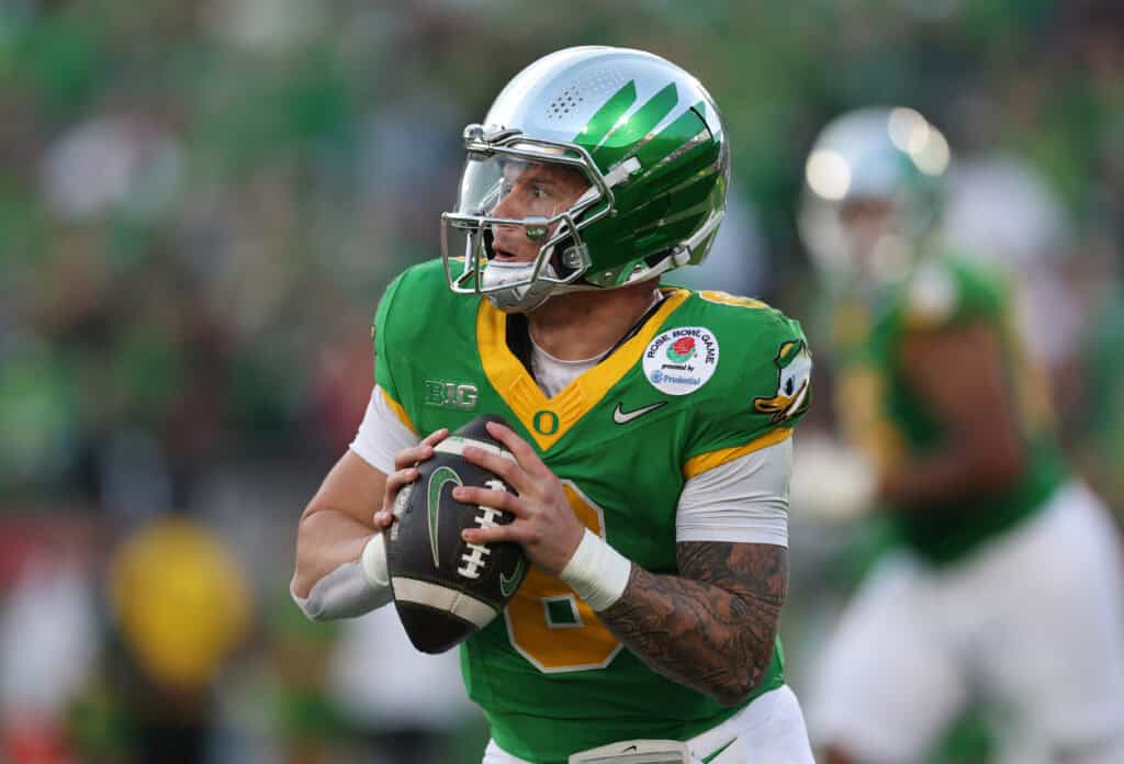 PASADENA, CALIFORNIA - JANUARY 01: Dillon Gabriel #8 of the Oregon Ducks scrambles during the third quarter against the Ohio State Buckeyes during the Rose Bowl Game Presented by Prudential at Rose Bowl Stadium on January 01, 2025 in Pasadena, California