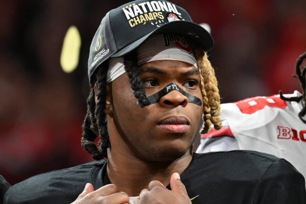 ATLANTA, GEORGIA - JANUARY 20: Quinshon Judkins #1 of the Ohio State Buckeyes celebrates after beating the Notre Dame Fighting Irish 34-23 in the 2025 CFP National Championship at the Mercedes-Benz Stadium on January 20, 2025 in Atlanta, Georgia.