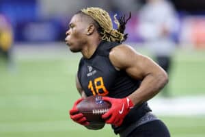 INDIANAPOLIS, INDIANA - MARCH 01: Quinshon Judkins #RB18 of Ohio State participates in a drill during the NFL Scouting Combine at Lucas Oil Stadium on March 01, 2025 in Indianapolis, Indiana