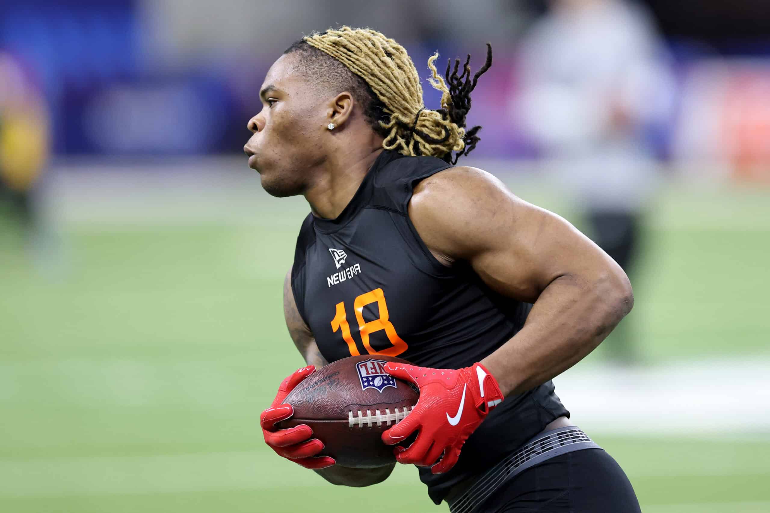 INDIANAPOLIS, INDIANA - MARCH 01: Quinshon Judkins #RB18 of Ohio State participates in a drill during the NFL Scouting Combine at Lucas Oil Stadium on March 01, 2025 in Indianapolis, Indiana