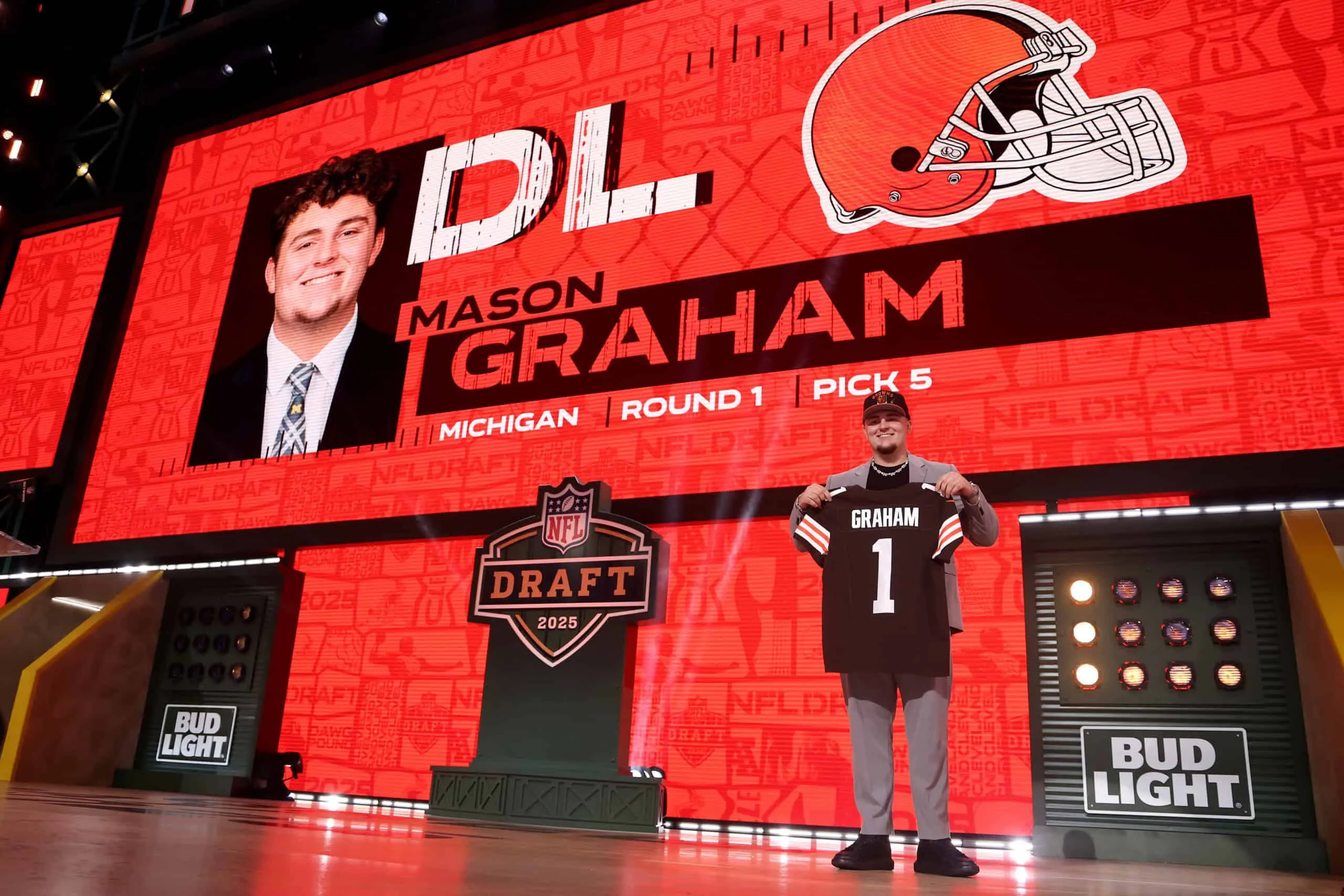 GREEN BAY, WISCONSIN - APRIL 24: Defensive Tackle Mason Graham of Michigan poses after being selected fifth overall pick by the Cleveland Browns during the first round of the 2025 NFL Draft at Lambeau Field on April 24, 2025 in Green Bay, Wisconsin.
