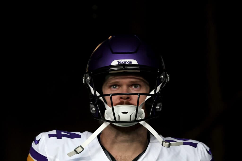 SEATTLE, WASHINGTON - DECEMBER 22: Sam Darnold #14 of the Minnesota Vikings looks on before the game Seahawks at Lumen Field on December 22, 2024 in Seattle, Washington.