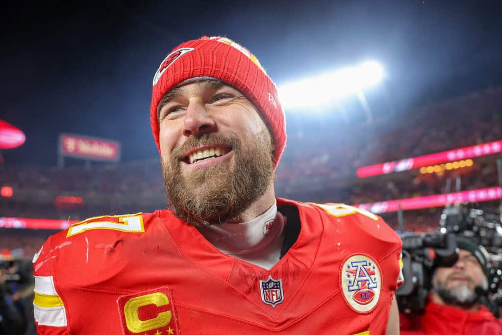 KANSAS CITY, MISSOURI - JANUARY 26: Travis Kelce #87 of the Kansas City Chiefs reacts after defeating the Buffalo Bills 32-29 in the AFC Championship Game at GEHA Field at Arrowhead Stadium on January 26, 2025 in Kansas City, Missouri.