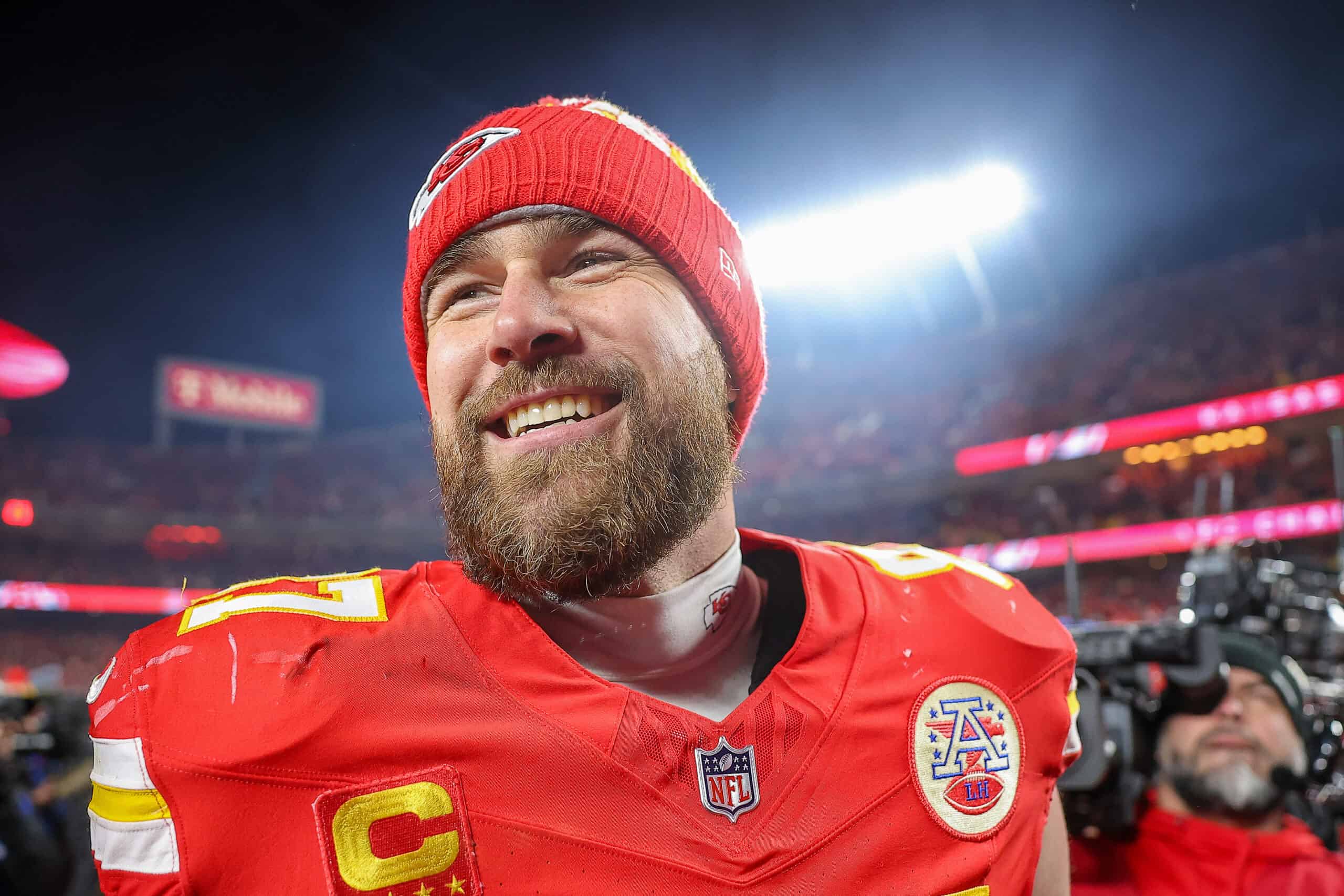 KANSAS CITY, MISSOURI - JANUARY 26: Travis Kelce #87 of the Kansas City Chiefs reacts after defeating the Buffalo Bills 32-29 in the AFC Championship Game at GEHA Field at Arrowhead Stadium on January 26, 2025 in Kansas City, Missouri.