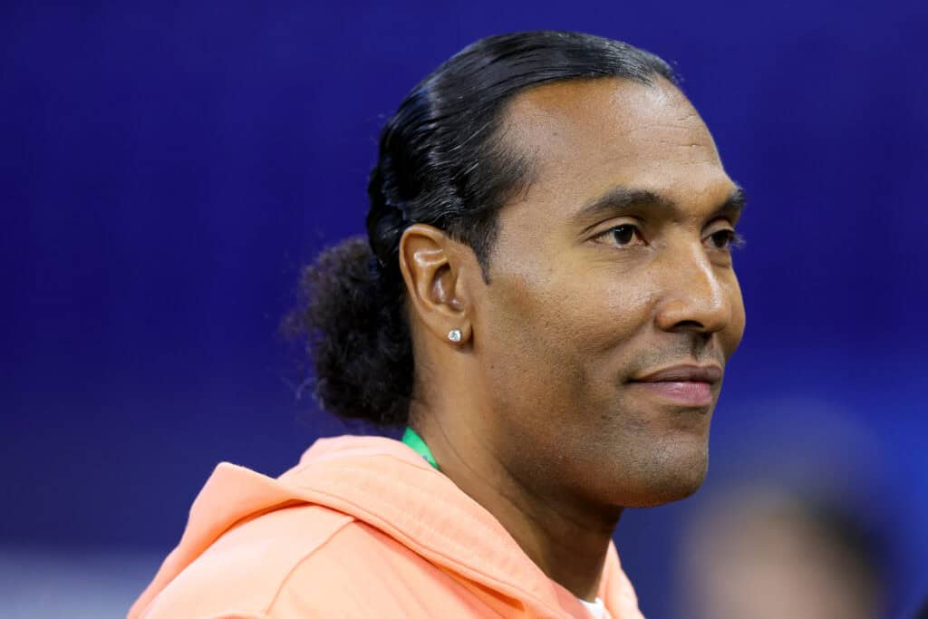 INDIANAPOLIS, INDIANA - MARCH 04: Former NFL player T.J. Houshmandzadeh looks on during the NFL Combine at Lucas Oil Stadium on March 04, 2023 in Indianapolis, Indiana.