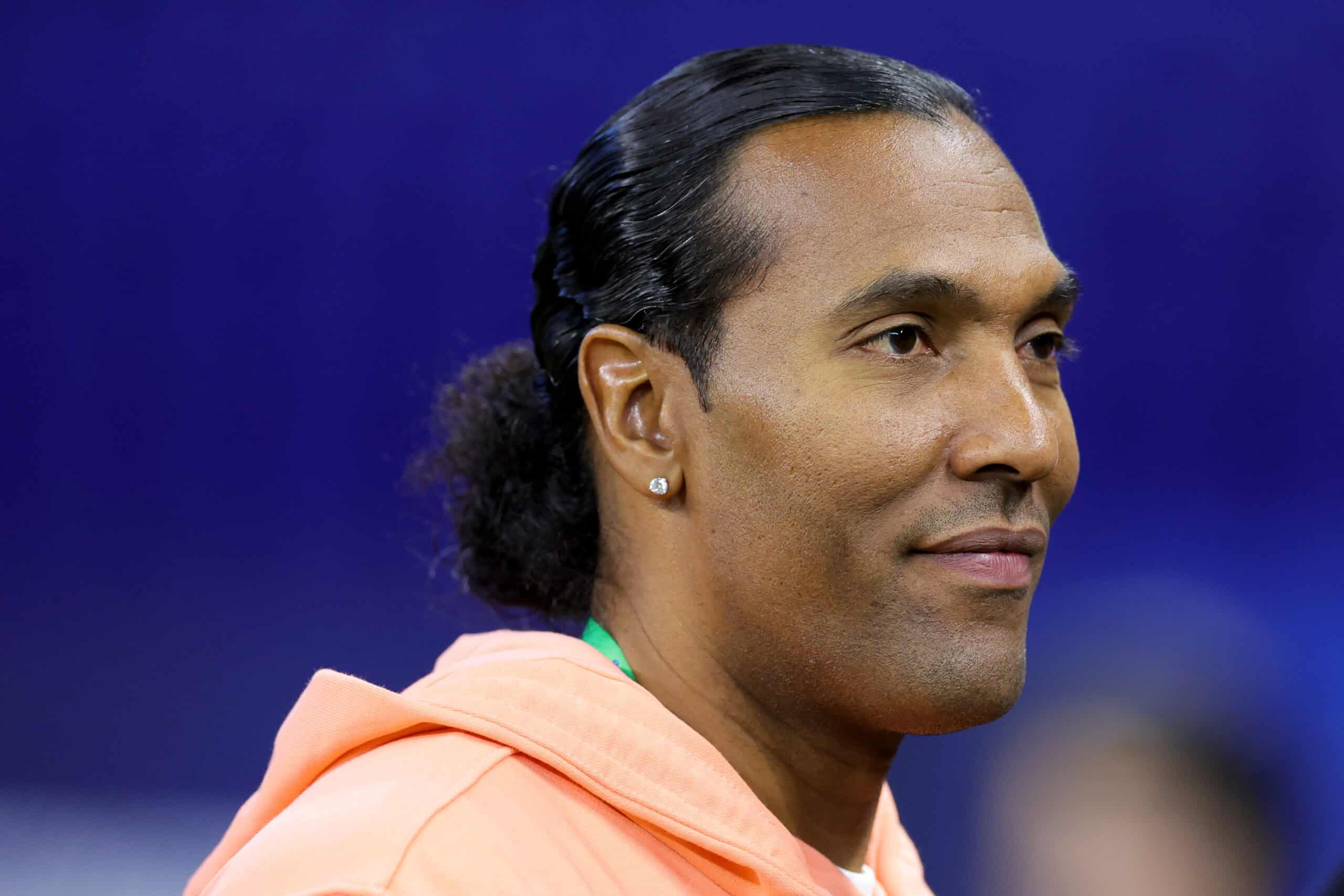 INDIANAPOLIS, INDIANA - MARCH 04: Former NFL player T.J. Houshmandzadeh looks on during the NFL Combine at Lucas Oil Stadium on March 04, 2023 in Indianapolis, Indiana.