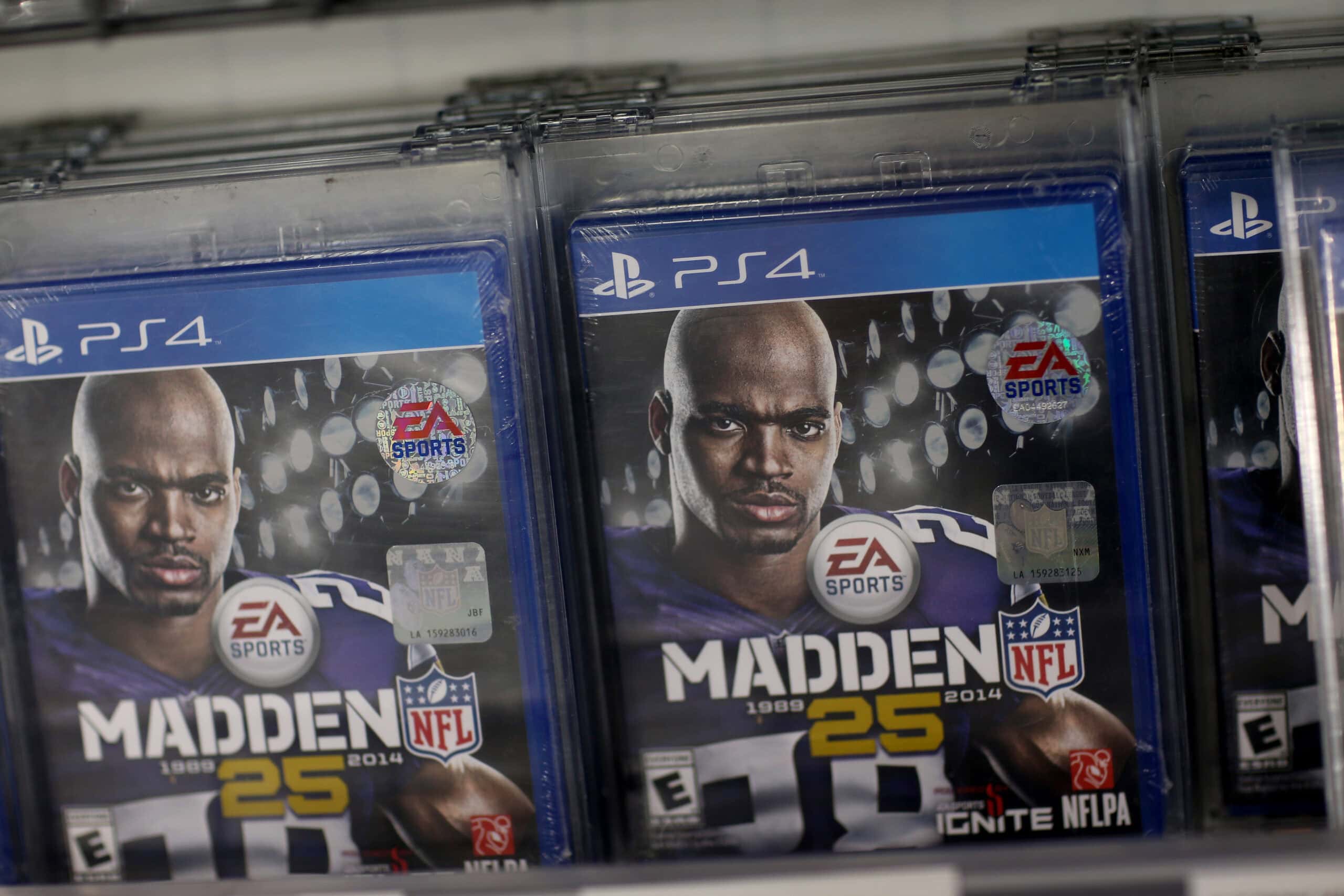 PEMBROKE PINES, FL - NOVEMBER 15: Madden 25 for the new Sony Playstation 4 is seen on display at Best Buy after the console went on sale at midnight on November 15, 2013 in Pembroke Pines, Florida. PlayStation 4 is the follow-up to the company's PlayStation 3 and is priced at $400.