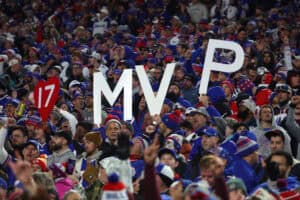 ORCHARD PARK, NEW YORK - NOVEMBER 17: Buffalo Bills fans hold signs cheering for Josh Allen #17 to be MVP of the NFL during the second half against the Kansas City Chiefs at Highmark Stadium on November 17, 2024 in Orchard Park, New York