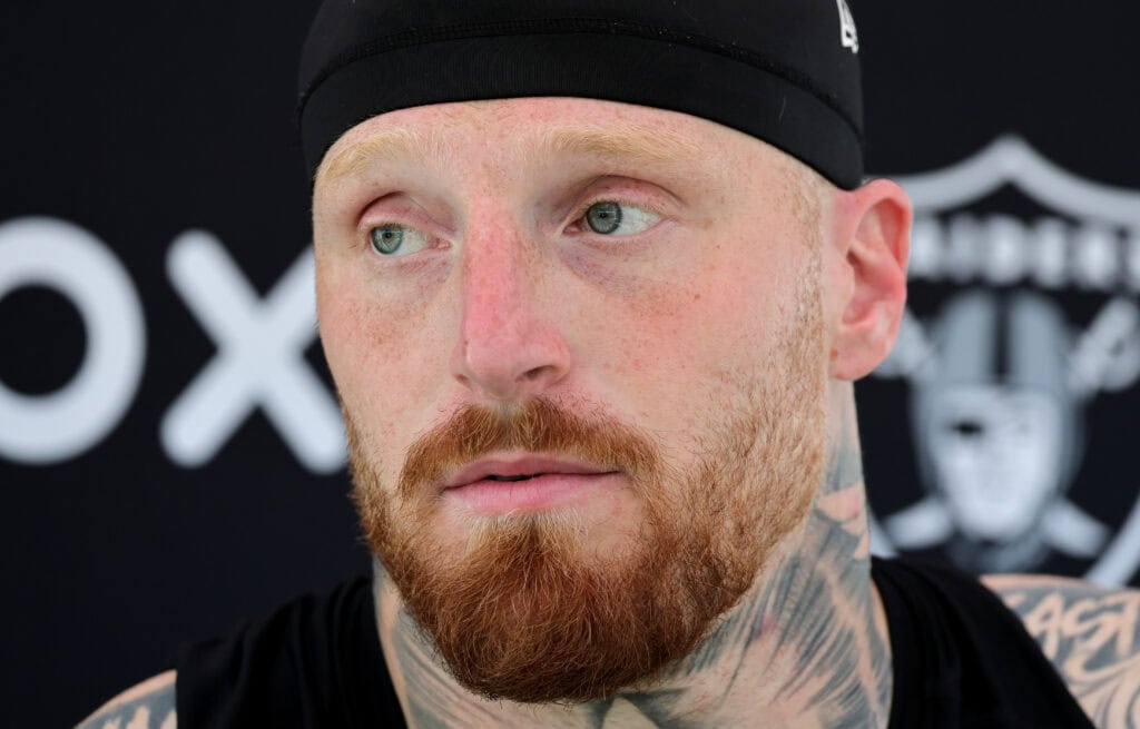 HENDERSON, NEVADA - MAY 21: Maxx Crosby #98 of the Las Vegas Raiders attends a news conference after an OTA offseason workout at the Las Vegas Raiders Headquarters/Intermountain Healthcare Performance Center on May 21, 2025 in Henderson, Nevada.
