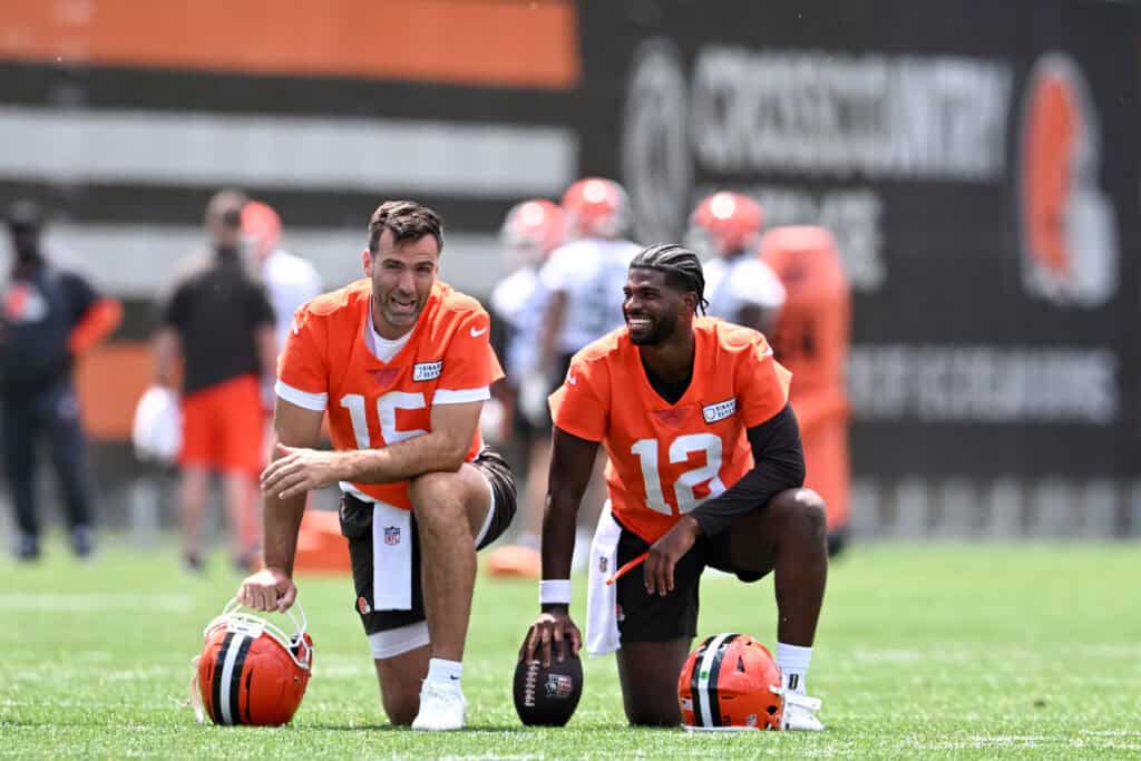 BEREA, OHIO - JUNE 10: Joe Flacco #15 and Shedeur Sanders #12 of the Cleveland Browns laugh during Cleveland Browns mandatory minicamp at CrossCountry Mortgage Campus on June 10, 2025 in Berea, Ohio.