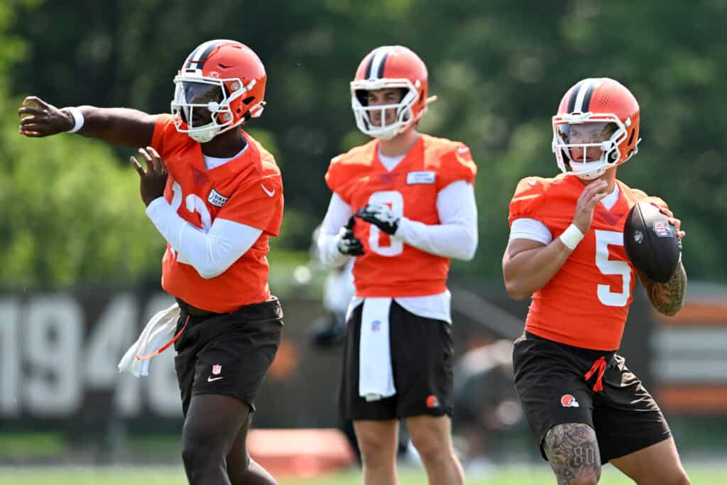 BEREA, OHIO - JUNE 11: Shedeur Sanders #12 and Dillon Gabriel #5 of the Cleveland Browns run a drill as Kenny Pickett #8 looks on during Cleveland Browns mandatory minicamp at CrossCountry Mortgage Campus on June 11, 2025 in Berea, Ohio.